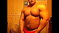 [beefymuscle.com] Megamuscle boy showing off his power