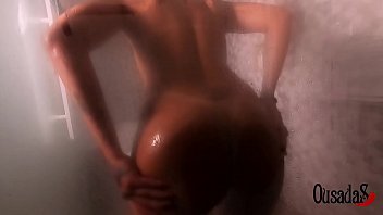Brazilian porn star Amanda Souza is caught off guard in the bath